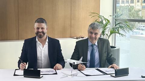 Tarek Muhiddin, COO of Amac Aerospace and Chadi Saade, President of Airbus Corporate Jets, signing a firm partnership agreement.