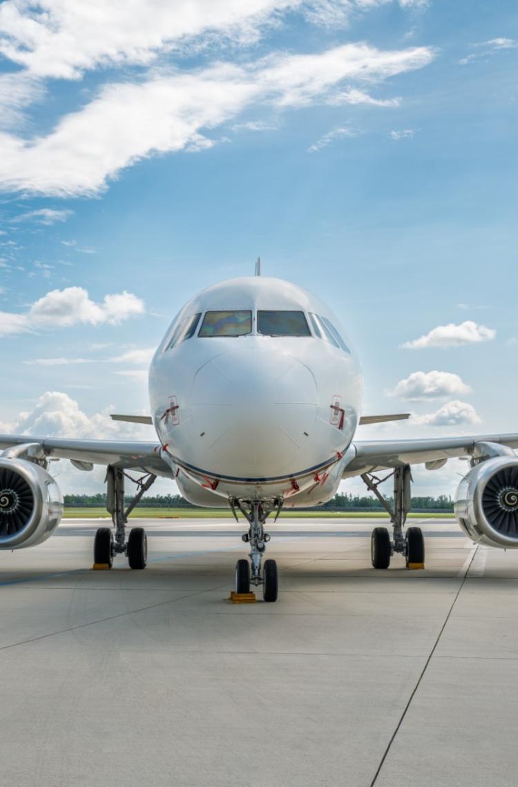 ACJ319ceo OE-ICE in the tarmac, front view
