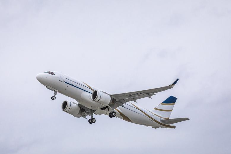 Comlux ACJ320neo in flight