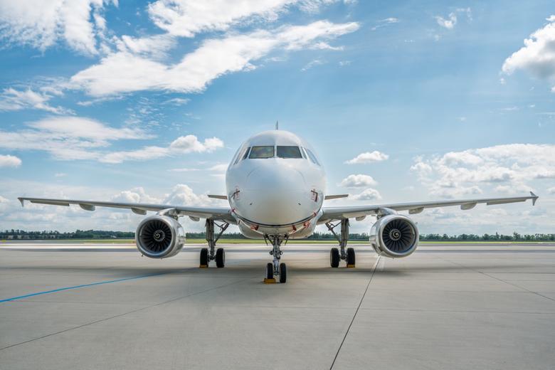 ACJ319ceo OE-ICE in the tarmac, front view